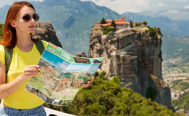 Beautiful tourist greece with meteora monasteries background 650x400